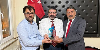 UYAFA heyeti, Kars Gazeteciler Cemiyeti Başkanı Ercüment Daşdelen’i ziyaret etti