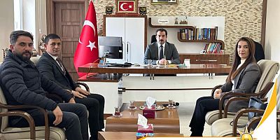 Arpaçay ilçe başkanından kaymakam Muhammed Burak AKKÖZ'e ziyaret