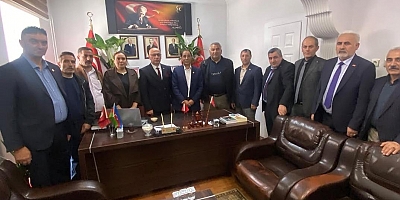 Kars’ta Muhtarlardan MHP İl Başkanlığı’na Ziyaret