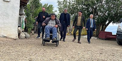 MHP’li Başkanlardan İhtiyaç Sahibi Aileye Akülü Araç Desteği